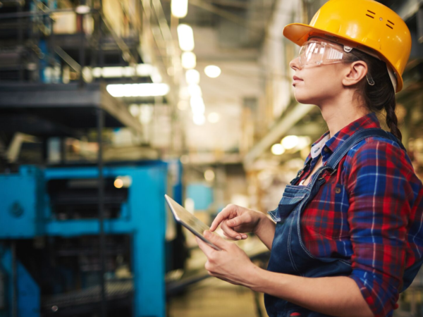 woman hard hat inventory clipboard