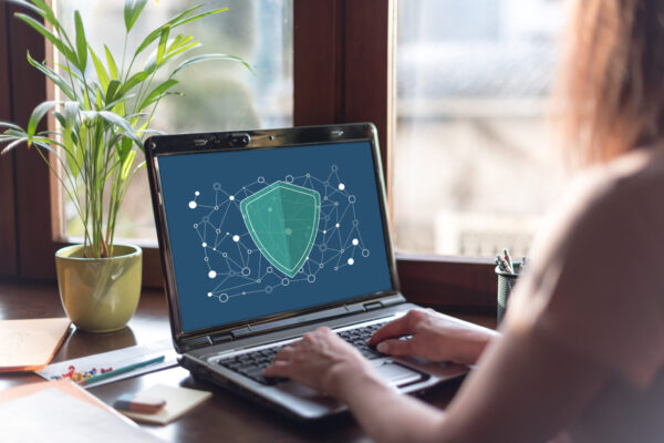 Network safety concept on a laptop screen Laptop screen displaying a network safety concept